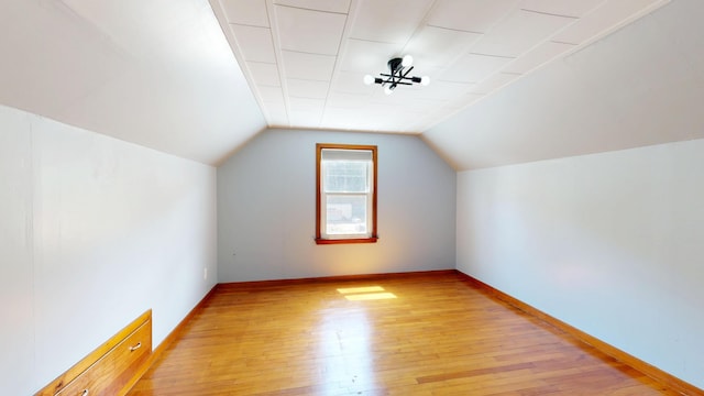 118 Riverside Dr, Auburn, ME 04210 - bonus room with light wood-style floors, baseboards, and lofted ceiling