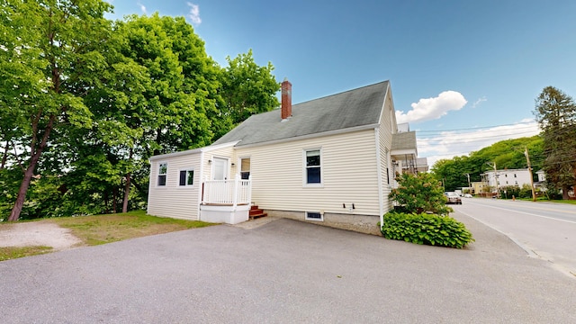 118 Riverside Dr, Auburn, ME 04210 - view of front of home with a chimney