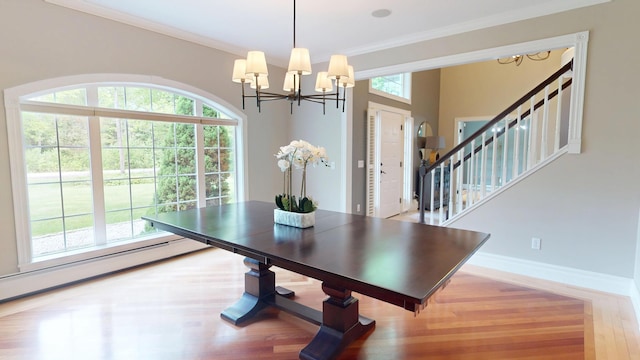 67 Joans Hill Rd, Bangor, ME 04401 - dining room featuring a chandelier, crown molding, wood finished floors, stairway, and baseboards