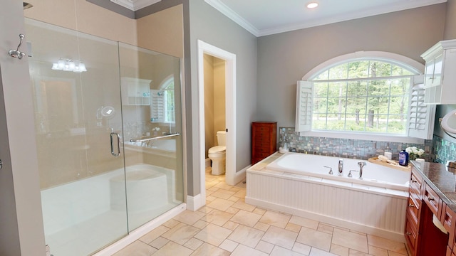67 Joans Hill Rd, Bangor, ME 04401 - bathroom with toilet, a shower stall, a bath, ornamental molding, and vanity