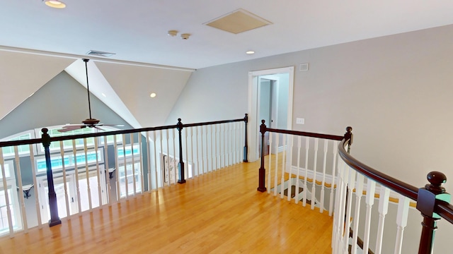 67 Joans Hill Rd, Bangor, ME 04401 - corridor with an upstairs landing, wood finished floors, recessed lighting, and vaulted ceiling