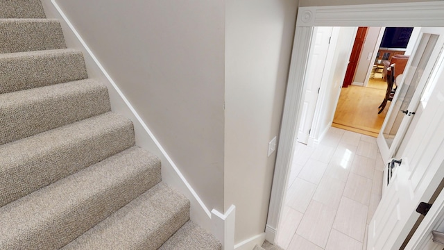 67 Joans Hill Rd, Bangor, ME 04401 - stairs featuring baseboards
