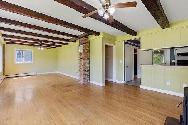 95 Riverview Dr, Gardiner, ME 04345 - unfurnished living room featuring ceiling fan, healthy amount of natural light, wood-type flooring, and beamed ceiling