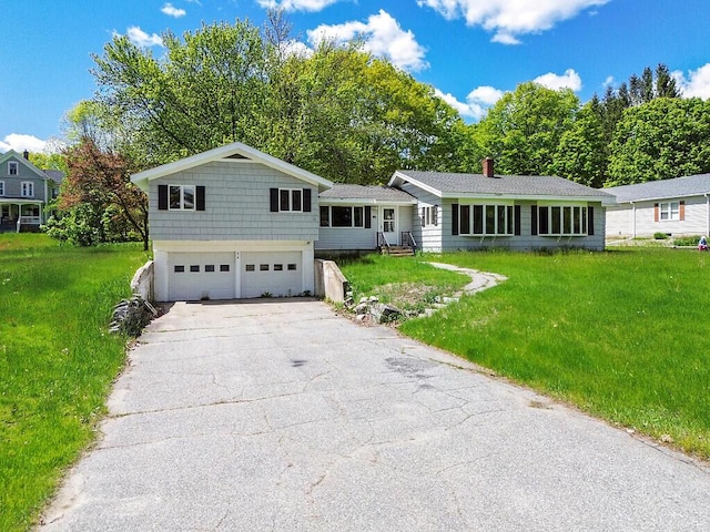 95 Riverview Dr, Gardiner, ME 04345 - single story home with an attached garage, a front lawn, and asphalt driveway