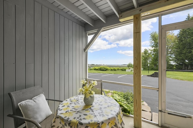 1801 Post Rd Unit 144, Wells, ME 04090 - sunroom featuring beamed ceiling and plenty of natural light