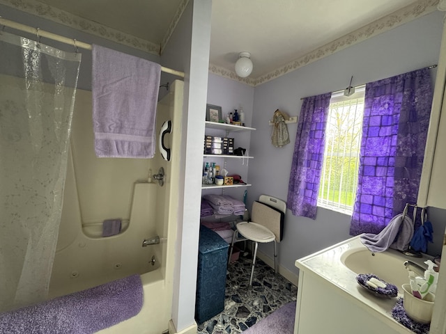 41 S Main St, Guilford, ME 04443 - bathroom with shower / bath combination with curtain, vanity, and baseboards