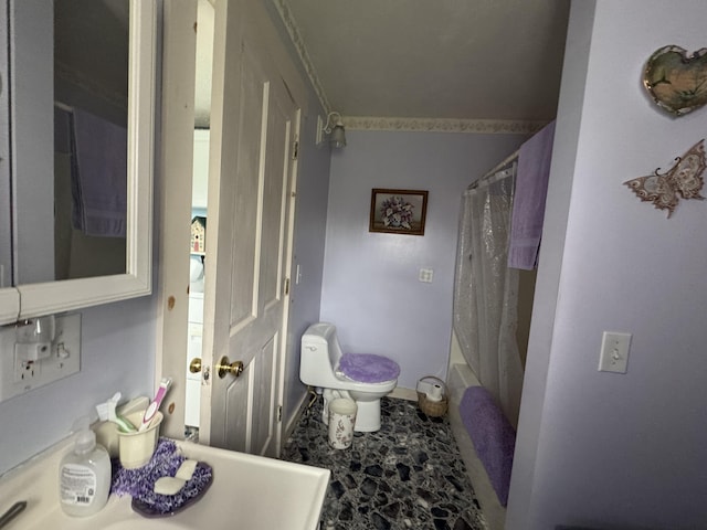 41 S Main St, Guilford, ME 04443 - full bath featuring toilet, baseboards, and shower / bath combination with curtain