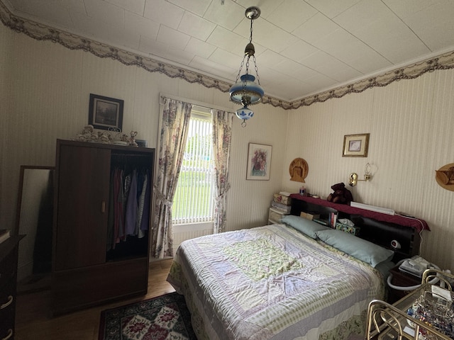 41 S Main St, Guilford, ME 04443 - bedroom featuring wood finished floors