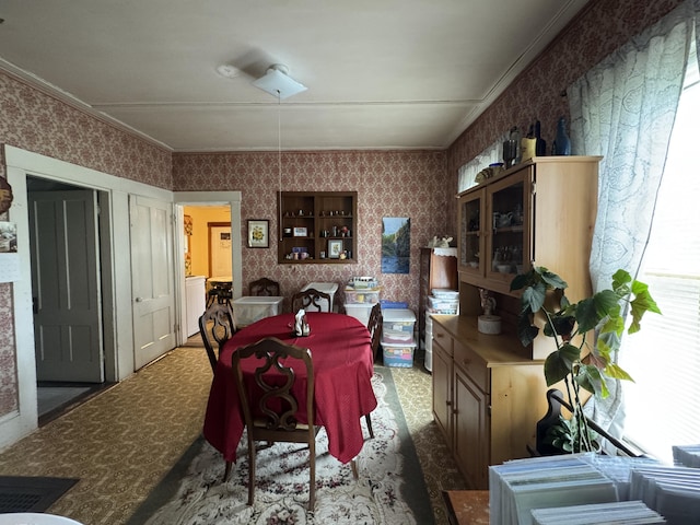 41 S Main St, Guilford, ME 04443 - dining room featuring ornamental molding and wallpapered walls