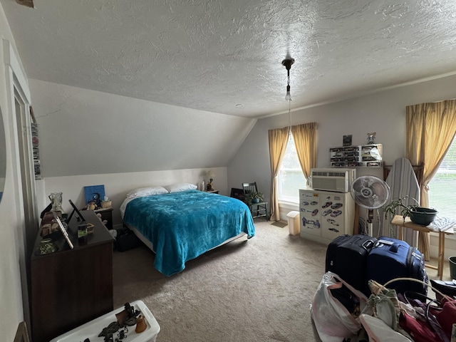 41 S Main St, Guilford, ME 04443 - carpeted bedroom featuring a textured ceiling, lofted ceiling, and cooling unit