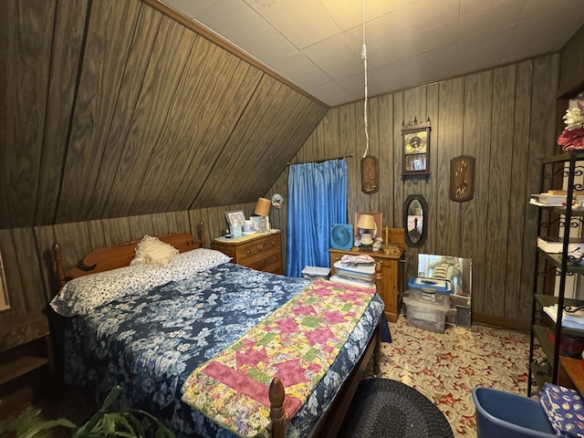 41 S Main St, Guilford, ME 04443 - bedroom featuring wood walls, carpet, and lofted ceiling