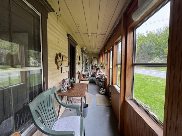 41 S Main St, Guilford, ME 04443 - sunroom featuring wooden walls and wood ceiling