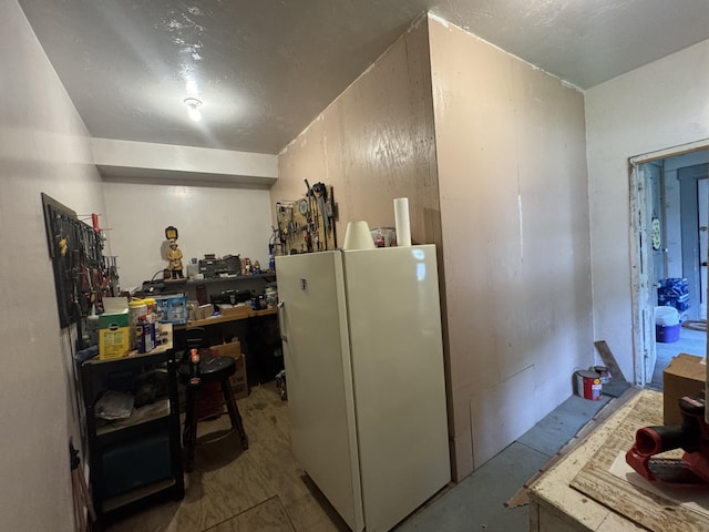 41 S Main St, Guilford, ME 04443 - kitchen featuring freestanding refrigerator