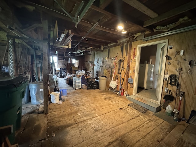 41 S Main St, Guilford, ME 04443 - basement featuring freestanding refrigerator