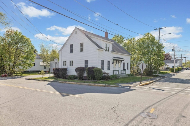 1 Fall St, Biddeford, ME 04005 - view of home's exterior featuring a chimney