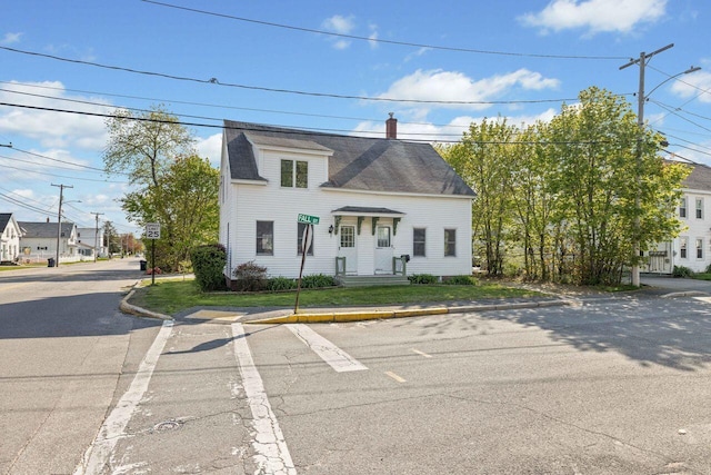 1 Fall St, Biddeford, ME 04005 - view of front of home featuring a chimney and a shingled roof