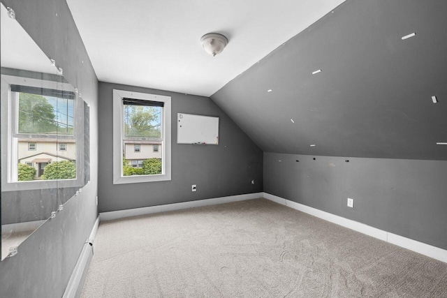 1 Fall St, Biddeford, ME 04005 - bonus room with carpet, lofted ceiling, and baseboards