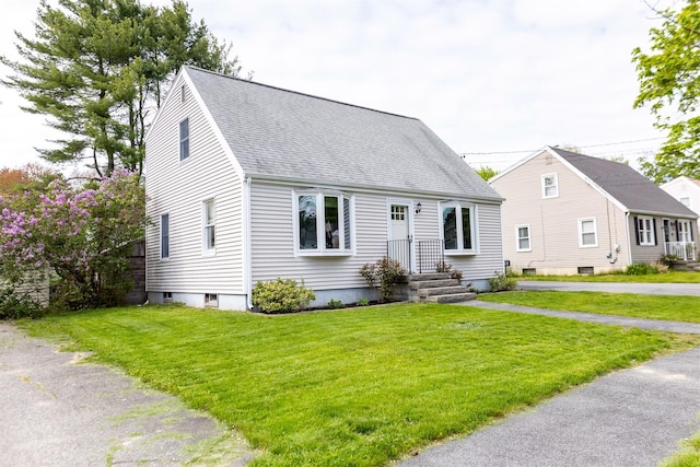 22 Penn Ave, Portland, ME 04103 - new england style home featuring roof with shingles and a front lawn