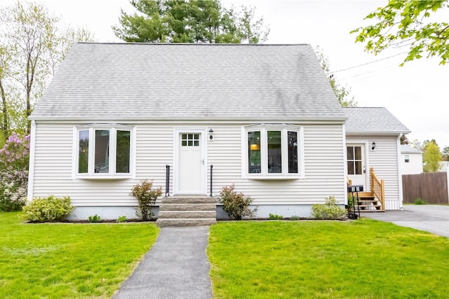 22 Penn Ave, Portland, ME 04103 - new england style home with a shingled roof