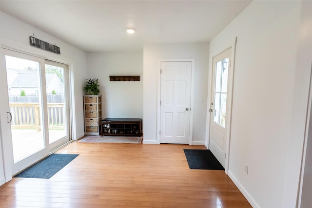 22 Penn Ave, Portland, ME 04103 - entryway with light wood-style floors, baseboards, and recessed lighting