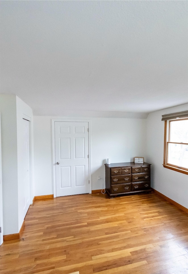 22 Penn Ave, Portland, ME 04103 - bedroom with light wood-type flooring and baseboards