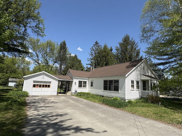 66 Pleasant St, Passadumkeag, ME 04461 - view of front of property featuring driveway, an attached garage, and crawl space