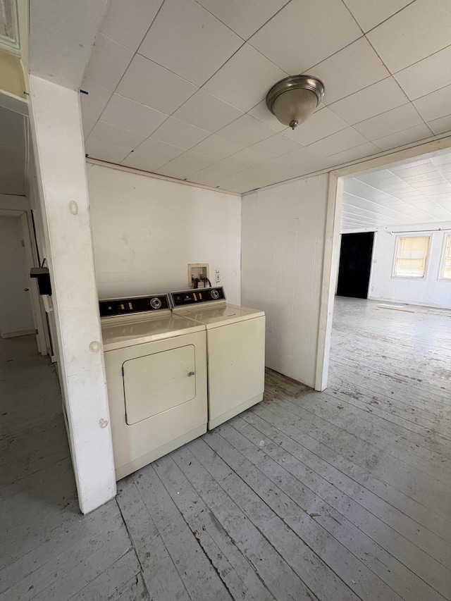 66 Pleasant St, Passadumkeag, ME 04461 - washroom featuring washer and clothes dryer and light wood finished floors