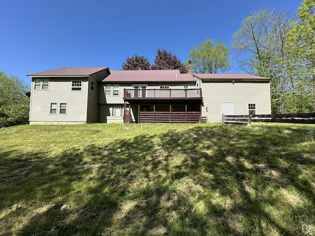 5 Grant Rd, Saint Albans, ME 04971 - back of house with a yard, a deck, a chimney, and metal roof