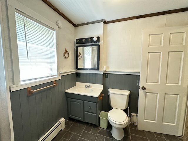 5 Grant Rd, Saint Albans, ME 04971 - bathroom featuring toilet, vanity, wooden walls, tile patterned flooring, and ornamental molding