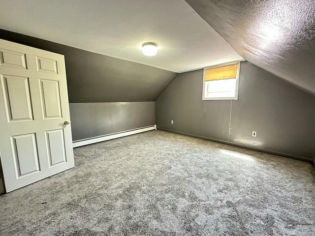 5 Grant Rd, Saint Albans, ME 04971 - additional living space featuring carpet floors, a baseboard heating unit, lofted ceiling, and baseboards