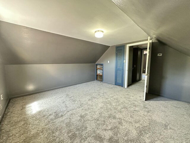 5 Grant Rd, Saint Albans, ME 04971 - bonus room featuring carpet, lofted ceiling, and baseboards