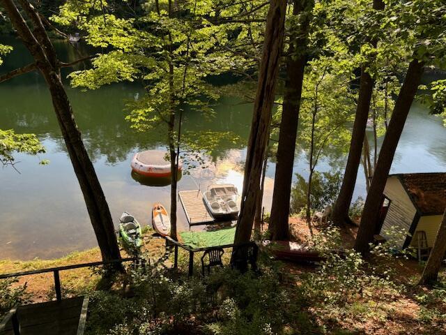 55 Sandy Bottom Rd, Turner, ME 04282 - water view with a boat dock