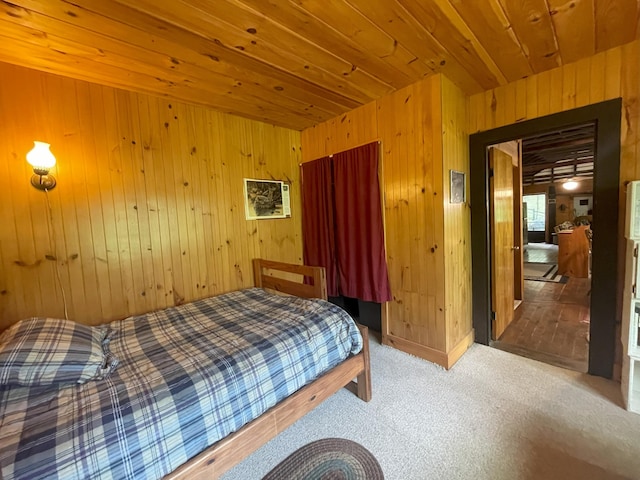 55 Sandy Bottom Rd, Turner, ME 04282 - carpeted bedroom featuring wood walls