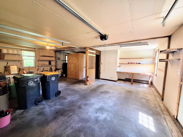 2 Gunstock Rd, Scarborough, ME 04074 - garage featuring a garage door opener