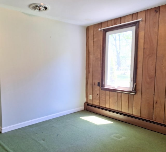 2 Gunstock Rd, Scarborough, ME 04074 - unfurnished room featuring a baseboard radiator, carpet floors, baseboards, and wood walls