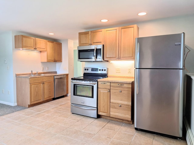 2 Gunstock Rd, Scarborough, ME 04074 - kitchen with stainless steel appliances, light brown cabinets, light countertops, recessed lighting, and a sink
