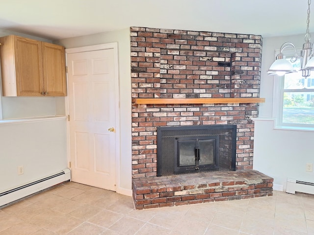 2 Gunstock Rd, Scarborough, ME 04074 - detailed view of a brick fireplace, a baseboard heating unit, and baseboards