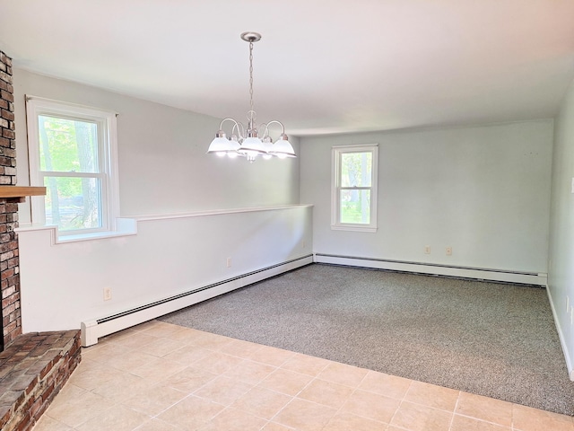 2 Gunstock Rd, Scarborough, ME 04074 - spare room with a brick fireplace, a chandelier, a baseboard heating unit, baseboard heating, and light colored carpet