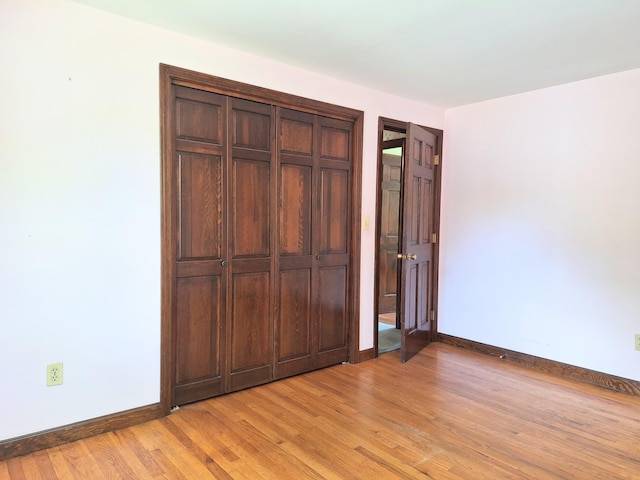 2 Gunstock Rd, Scarborough, ME 04074 - unfurnished bedroom with baseboards and light wood finished floors