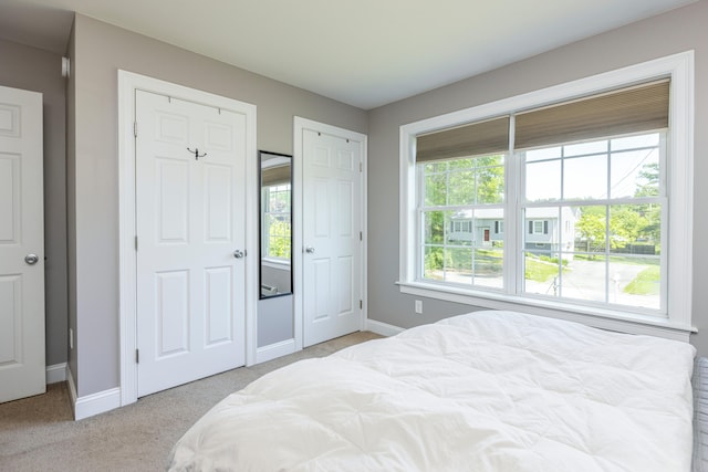 13 Daggett St, Portland, ME 04103 - carpeted bedroom featuring baseboards