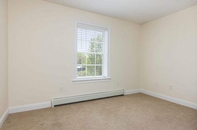 13 Daggett St, Portland, ME 04103 - unfurnished room featuring a baseboard radiator, carpet floors, plenty of natural light, and baseboards