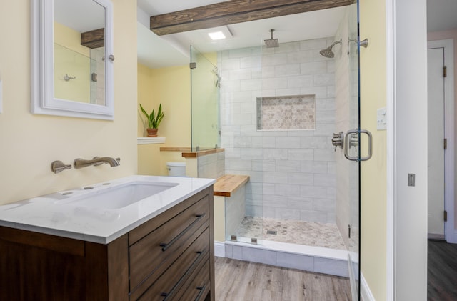 13 Daggett St, Portland, ME 04103 - full bath featuring wood finished floors, a shower stall, and vanity