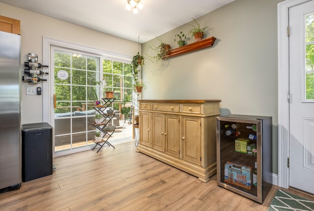13 Daggett St, Portland, ME 04103 - dining room featuring light wood-type flooring and beverage cooler