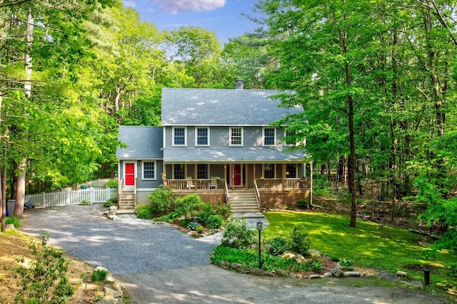 58 Josiah Norton Rd, York, ME 03902 - colonial home with covered porch, a shingled roof, and gravel driveway