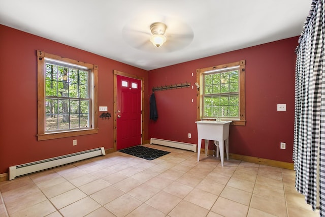58 Josiah Norton Rd, York, ME 03902 - foyer entrance with a baseboard heating unit, a baseboard radiator, healthy amount of natural light, and ceiling fan