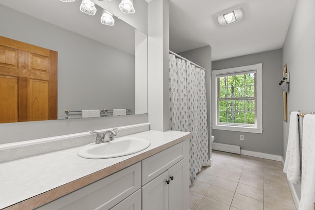 58 Josiah Norton Rd, York, ME 03902 - bathroom featuring vanity, tile patterned flooring, toilet, baseboard heating, and a shower with shower curtain