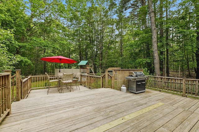 58 Josiah Norton Rd, York, ME 03902 - wooden terrace with outdoor dining space and grilling area