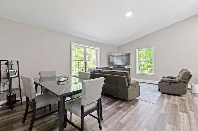 186 Yarmouth Rd, Gray, ME 04039 - dining area with lofted ceiling, wood finished floors, healthy amount of natural light, baseboards, and recessed lighting
