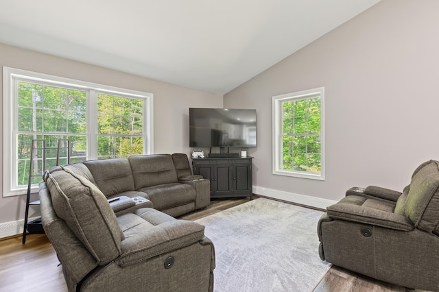 186 Yarmouth Rd, Gray, ME 04039 - living area with wood finished floors, lofted ceiling, and baseboards