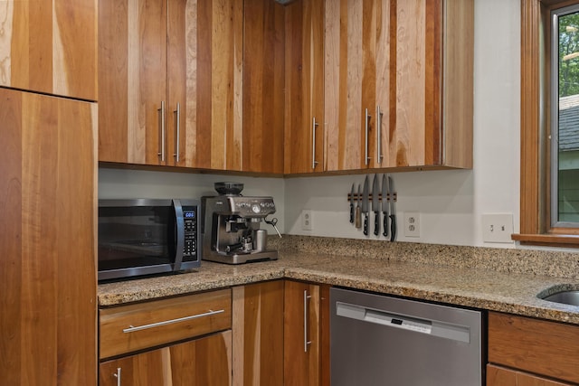 23 Stovers Point Rd, Harpswell, ME 04079 - kitchen with appliances with stainless steel finishes, brown cabinets, and light stone counters